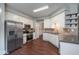 Bright kitchen features stainless appliances, granite counters and tile backsplash at 2430 Josephine Rd, Garner, NC 27529