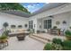 Outdoor patio with comfortable seating around a fire pit and dining area, great for entertaining at 2430 Josephine Rd, Garner, NC 27529