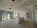 Bright living room, under construction, boasting expansive space, natural light, and large sliding doors at 246 Norman Ave, Lillington, NC 27546