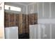 Bathroom under construction, revealing insulation and pipe work, ready for customization at 25 Autumnwood Ln, Spring Hope, NC 27882