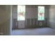 Bedroom with construction showing two large windows providing natural light at 25 Autumnwood Ln, Spring Hope, NC 27882