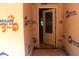 New home entryway featuring protective wrap and partially installed door at 25 Autumnwood Ln, Spring Hope, NC 27882