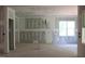 Spacious living room showing the construction with large windows providing natural light at 25 Autumnwood Ln, Spring Hope, NC 27882