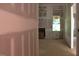 Living room under construction with open layout and kitchen view at 25 Autumnwood Ln, Spring Hope, NC 27882