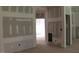 Living room showing the construction, featuring a fireplace and ample space at 25 Autumnwood Ln, Spring Hope, NC 27882