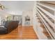 Inviting foyer featuring hardwood floors and an open staircase at 255 Morris Rd, Pittsboro, NC 27312