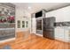 This kitchen has stainless appliances, wood accent walls and flooring, and a breakfast nook at 255 Morris Rd, Pittsboro, NC 27312