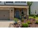Inviting front porch with chairs and manicured landscaping at 2586 Lacey Holt Rd, Graham, NC 27253