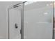 Shower features glass doors and a modern fixture at 2586 Lacey Holt Rd, Graham, NC 27253