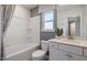 Bright bathroom featuring a bathtub, shower, toilet, and white vanity with sink at 2799 Cassius Dr, Apex, NC 27502