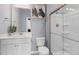 Bathroom featuring a shower, toilet, and white vanity at 2799 Cassius Dr, Apex, NC 27502