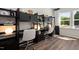 Study with two built-in shelving units with desks at 2799 Cassius Dr, Apex, NC 27502