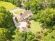Aerial view of a house with a large lot, well-manicured lawn and mature landscaping at 2945 Chimney Hill Trl, Rocky Mount, NC 27804