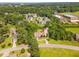 Aerial view of a house with a large lot and mature landscaping in a desirable community at 2945 Chimney Hill Trl, Rocky Mount, NC 27804