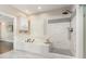 Luxurious bathroom featuring marble tile, shower, soaking tub and abundant cabinet space at 2945 Chimney Hill Trl, Rocky Mount, NC 27804