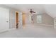Finished bonus room with carpet and a ceiling fan, featuring plenty of natural light at 2945 Chimney Hill Trl, Rocky Mount, NC 27804