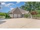 Two-car garage with an extra-large driveway, offering ample parking space at 2945 Chimney Hill Trl, Rocky Mount, NC 27804
