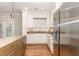 Kitchen with white cabinets, stainless steel appliances, granite counters, and an island with seating at 2945 Chimney Hill Trl, Rocky Mount, NC 27804