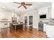 Gourmet kitchen featuring custom cabinets, stainless steel appliances, and a granite island with seating at 2945 Chimney Hill Trl, Rocky Mount, NC 27804