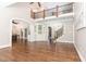 A spacious living room features gleaming hardwood floors and an open layout, leading to the home's second story at 2945 Chimney Hill Trl, Rocky Mount, NC 27804