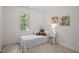 Bright bedroom features a full bed and a large window at 308 Fleming Dr, Durham, NC 27712