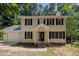 Beautiful two-story home with black shutters, a covered front porch, and an attached garage at 308 Fleming Dr, Durham, NC 27712