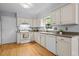 Well-maintained kitchen features ample cabinetry, modern appliances, and hardwood floors at 308 Fleming Dr, Durham, NC 27712