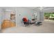 Spacious living room with a ceiling fan and sliding glass doors to the deck at 308 Fleming Dr, Durham, NC 27712