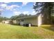 Backyard of home with newly mowed grass at 308 Plaza Dr, Garner, NC 27529