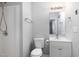 Bathroom featuring a vanity with a sink, a toilet, and a stand-up shower with door at 308 Plaza Dr, Garner, NC 27529