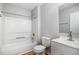 Well-lit bathroom features tub shower, toilet, and vanity with sink at 308 Plaza Dr, Garner, NC 27529