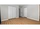 Bedroom features luxury vinyl plank flooring and ample closet space at 308 Plaza Dr, Garner, NC 27529
