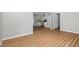 Bright living room featuring luxury vinyl plank flooring and neutral paint at 308 Plaza Dr, Garner, NC 27529