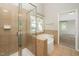 Bathroom featuring a walk-in shower and soaking tub at 316 Academia Ct, Durham, NC 27713