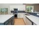 Well-appointed kitchen featuring stainless steel appliances and ample counter space at 316 Academia Ct, Durham, NC 27713