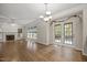 Spacious living room featuring hardwood floors, fireplace, and natural light at 3306 Meadowrun Dr, Durham, NC 27707