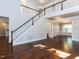 Foyer features a staircase, hardwood floors, and decorative molding, creating a welcoming and elegant entrance at 354 Crimson Way, Pittsboro, NC 27312
