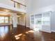 Spacious living room boasts hardwood floors, built-in shelving, and an open layout perfect for entertaining guests at 354 Crimson Way, Pittsboro, NC 27312