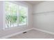 Walk-in closet with a large window at 354 Crimson Way, Pittsboro, NC 27312