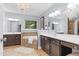 Primary bathroom with double vanity, soaker tub, chandelier, and tile floors at 3650 Pleasants Ridge Dr, Wake Forest, NC 27587