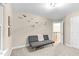 Cozy bedroom with neutral carpet, gray futon, and airplane decor creates a playful atmosphere at 3650 Pleasants Ridge Dr, Wake Forest, NC 27587