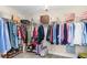Walk-in closet featuring ample hanging space, shelving, and organization solutions for stylish storage at 3650 Pleasants Ridge Dr, Wake Forest, NC 27587