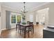 Elegant dining room with hardwood floors and a view into the living room at 3650 Pleasants Ridge Dr, Wake Forest, NC 27587