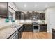 A kitchen featuring stainless steel appliances, granite countertops, and lots of cabinet space at 3650 Pleasants Ridge Dr, Wake Forest, NC 27587