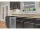 A bright kitchen featuring stainless steel appliances and granite countertops at 3650 Pleasants Ridge Dr, Wake Forest, NC 27587