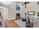 Comfortable living room with hardwood floors, a large canvas art, and vaulted ceilings at 3650 Pleasants Ridge Dr, Wake Forest, NC 27587