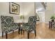 Cozy living room space showcases comfortable patterned chairs and a small decorative table at 3650 Pleasants Ridge Dr, Wake Forest, NC 27587