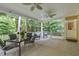 Large covered patio featuring a dining table and chairs, creating a welcoming outdoor space at 3650 Pleasants Ridge Dr, Wake Forest, NC 27587