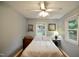 Bedroom featuring hardwood floors, natural light, and a neutral color palette at 3812 Vesta Dr, Raleigh, NC 27603
