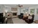 Inviting living room featuring a fireplace, comfortable seating, and plenty of natural light at 3812 Vesta Dr, Raleigh, NC 27603